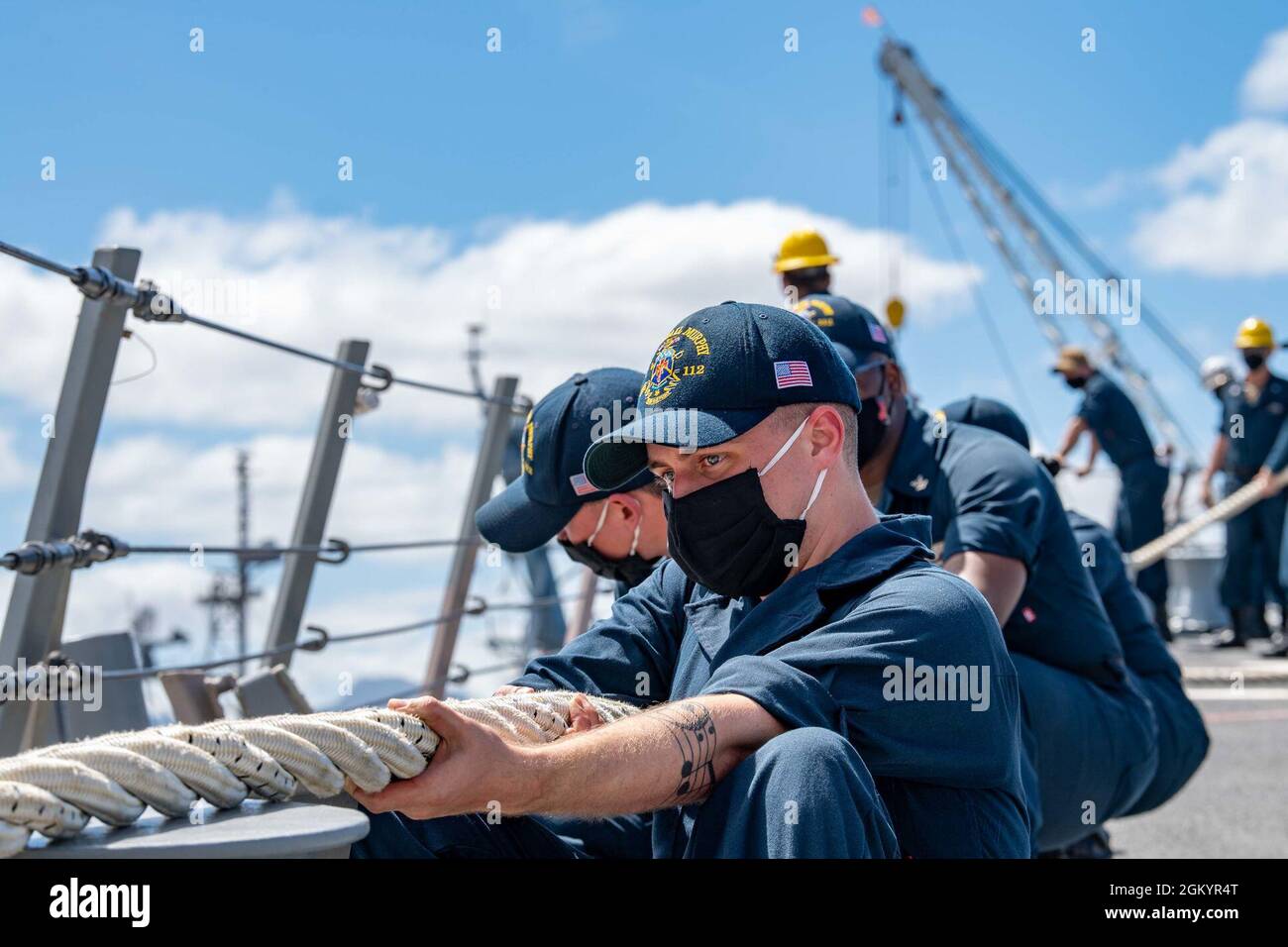 210730-N-LP924-1354 PACIFIC OCEAN (July 30, 2021) Sailors conduct line handling during sea and anchor detail aboard Arleigh Burke-class destroyer USS Michael Murphy (DDG 112), July 30, 2021. Murphy is currently underway conducting routine operations in U.S. Third Fleet. Stock Photo