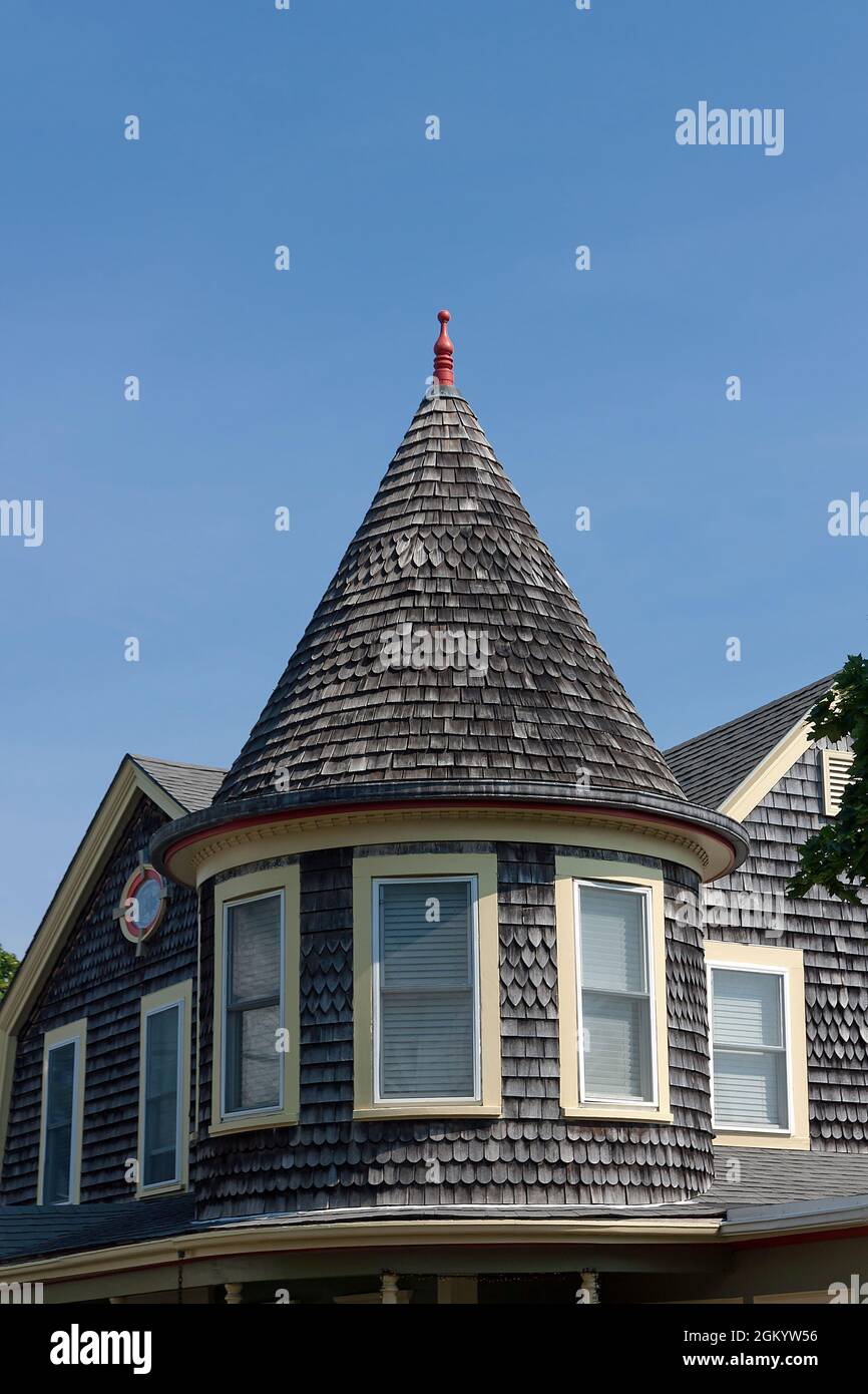 Turret (small tower) on a Queen Anne style house. Stock Photo