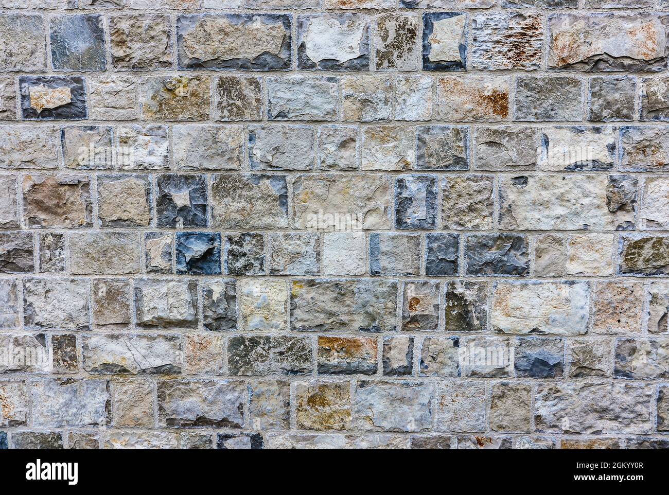 Beautiful Very Colorful Wall From Stone Bricks Stock Photo