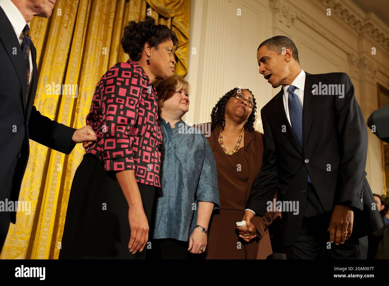 President Barack Obama greets Louvon Harris, left, Betty Byrd Boatner, right, both sisters of James Byrd, Jr., and Judy Shepard, center, mother of Matthew Shepard,  following his remarks at a reception commemorating the enactment of the Matthew Shepard and James Byrd Jr. Hate Crimes Prevention Act, in the East Room, of the White House, October 28, 2009.  (Official White House Photo by Pete Souza) This official White House photograph is being made available only for publication by news organizations and/or for personal use printing by the subject(s) of the photograph. The photograph may not be Stock Photo