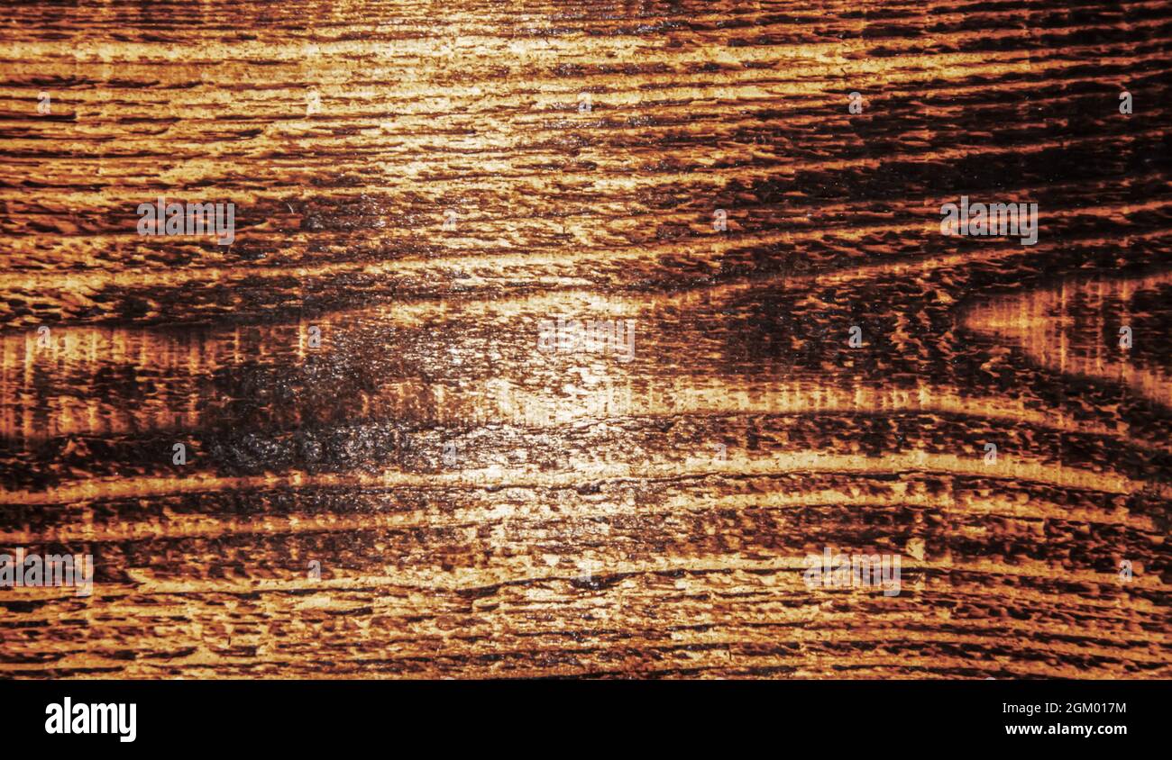 Wooden background from burnt oak planks. Texture. Without people. Horizontal photography. Stock Photo