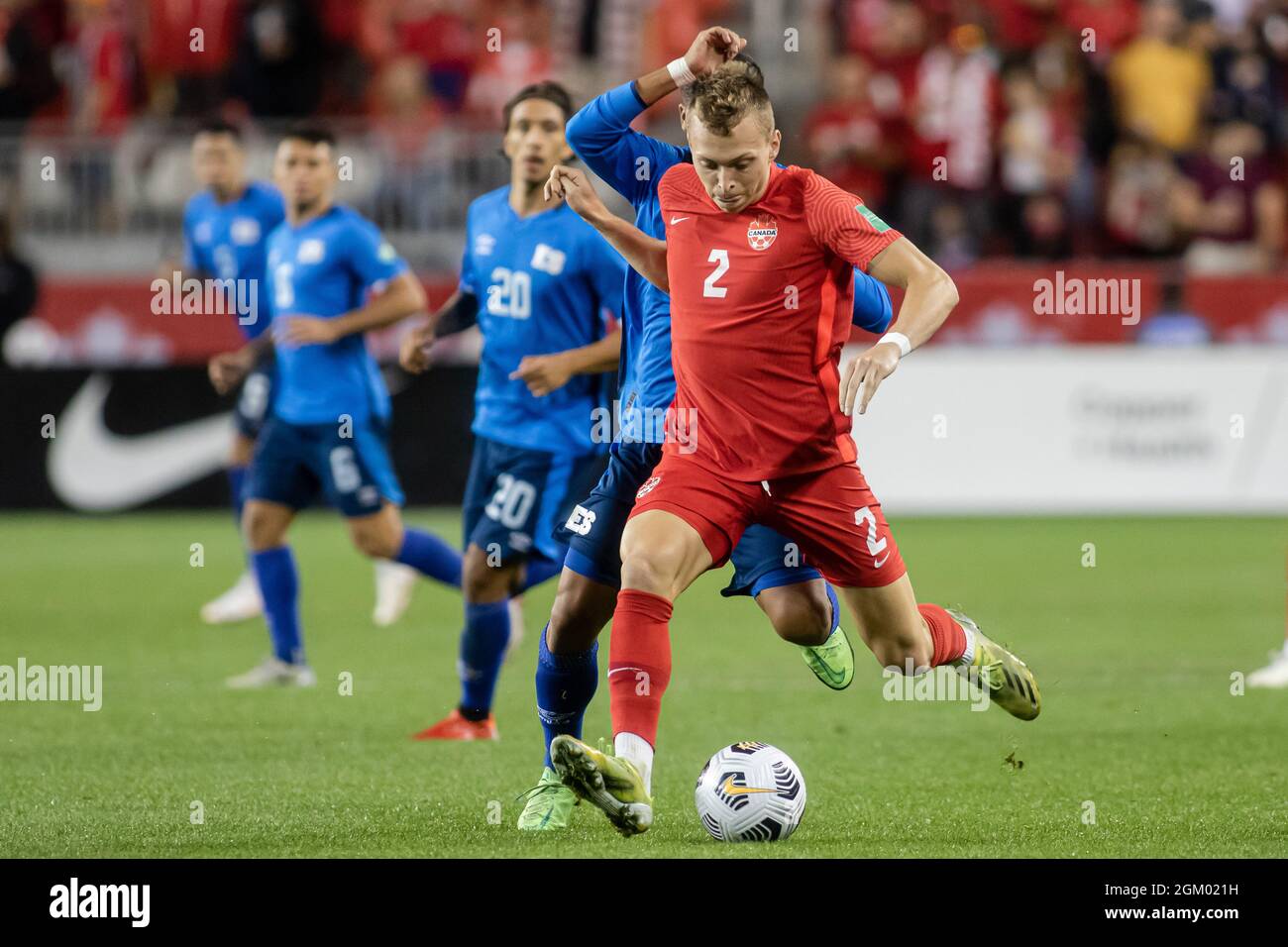 Toronto, Canada, September 8, 2021: Alistair Johnston (No.2) of Team Canada compete for the ball against Jairo Henríquez (No.17) of Team El Salvador during the CONCACAF FIFA World Cup Qualifying 2022 match at BMO Field in Toronto, Canada. Canada won the match 3-0. Stock Photo