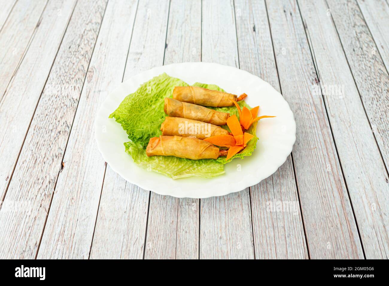 Delicious crispy fried prawn rolls cooked in a Chinese restaurant Stock ...