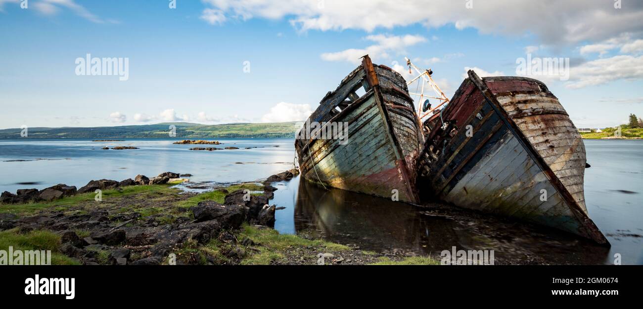 Old abandoned rusty fishing boats Stock Photo - Alamy