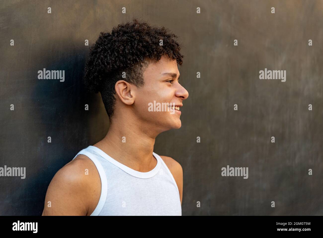 Smiling male black teenager hi-res stock photography and images - Alamy