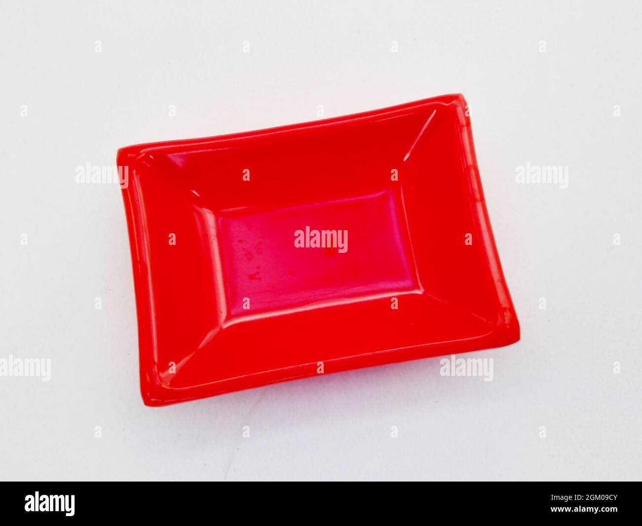 Red plate isolated on white background Stock Photo Alamy