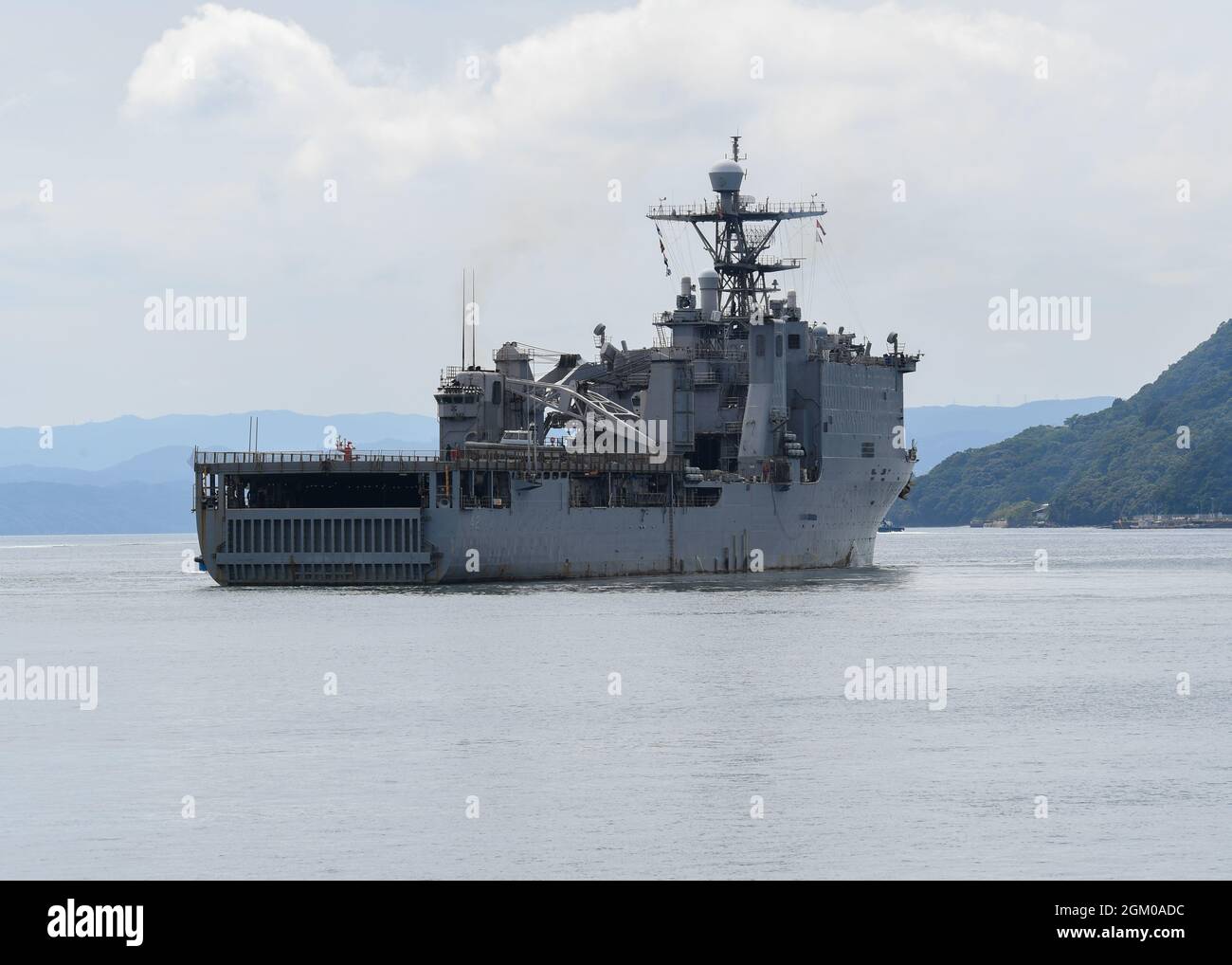 The amphibious dock landing ship USS Germantown (LSD 42) departs Commander, Fleet Activities Sasebo, Japan (CFAS) Sept. 15, 2021. Germantown will shift home ports from Sasebo to San Diego after serving as a forward-deployed ship in U.S. 7th Fleet since Jan. 5, 2011. (U.S. Navy photo by Mass Communication Specialist 3rd Class Jasmine Ikusebiala) Stock Photo