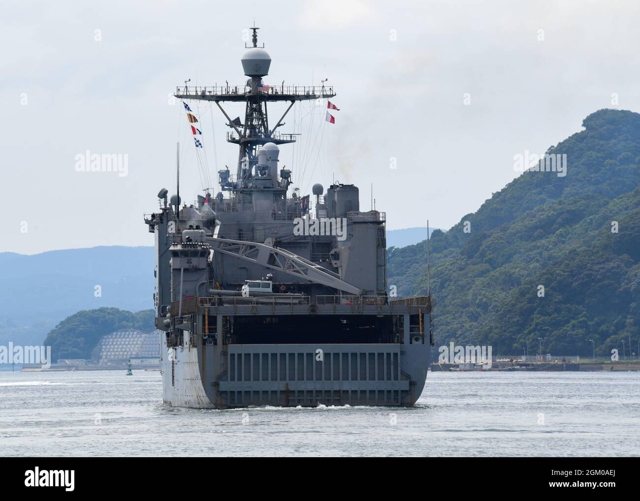 The amphibious dock landing ship USS Germantown (LSD 42) departs Commander, Fleet Activities Sasebo, Japan (CFAS) Sept. 15, 2021. Germantown will shift home ports from Sasebo to San Diego after serving as a forward-deployed ship in U.S. 7th Fleet since Jan. 5, 2011. (U.S. Navy photo by Mass Communication Specialist 3rd Class Jasmine Ikusebiala) Stock Photo