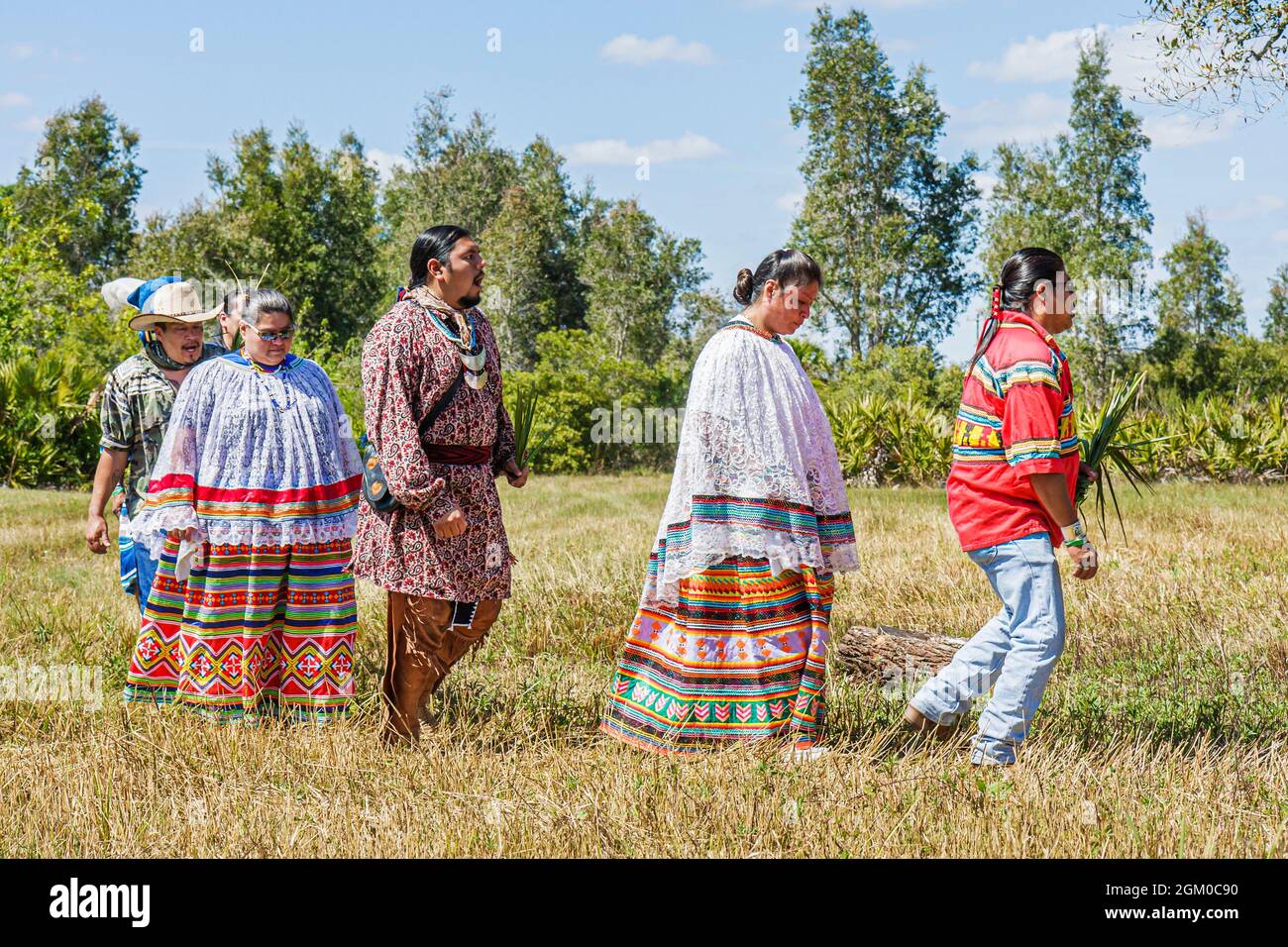 Florida Big Cypress,Seminole Indian Reservation Billie Swamp Safari,Native American Indian,stomp dance dancers women men traditional regalia patchwork Stock Photo