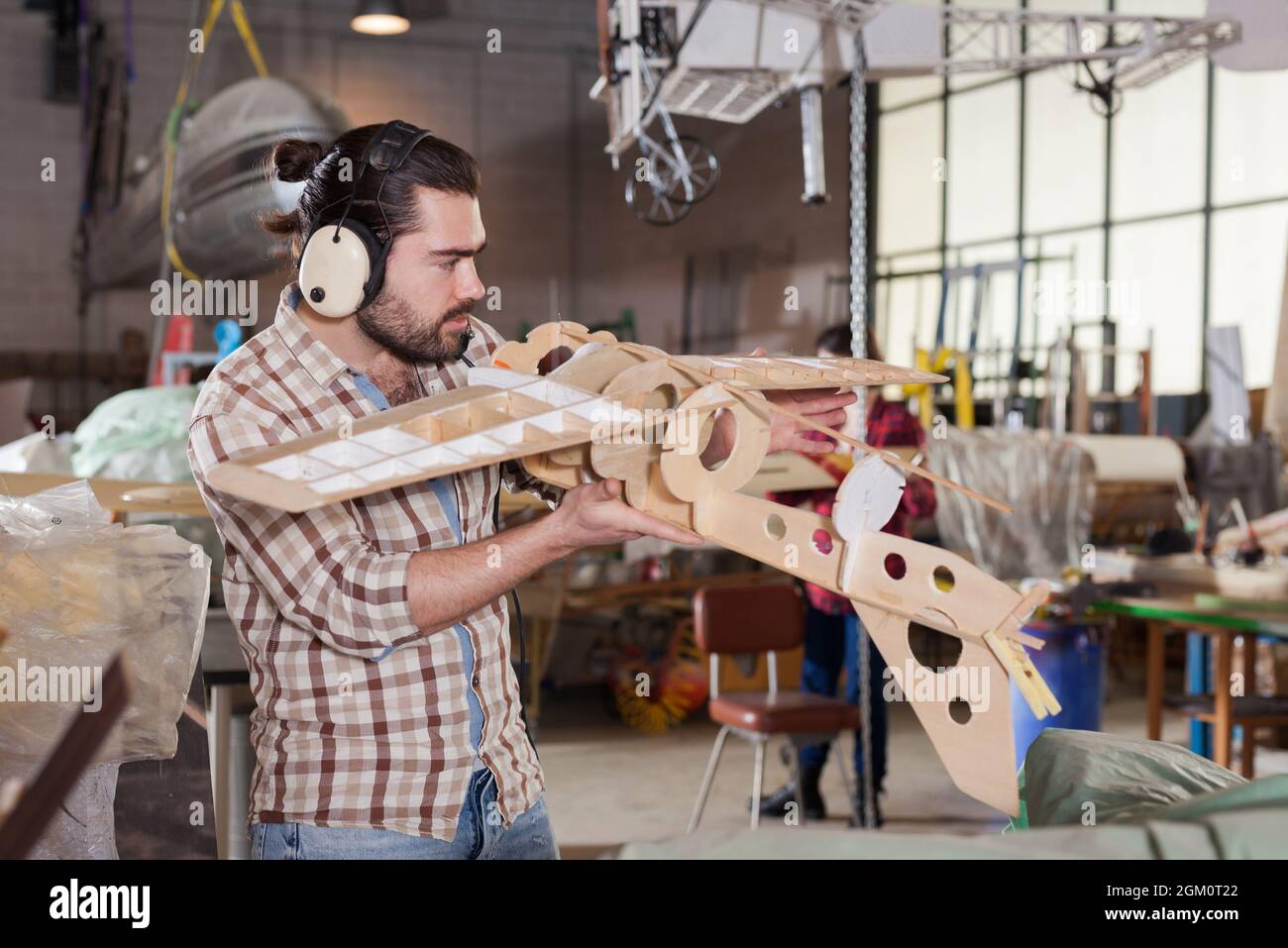 Male creating airplane models Stock Photo