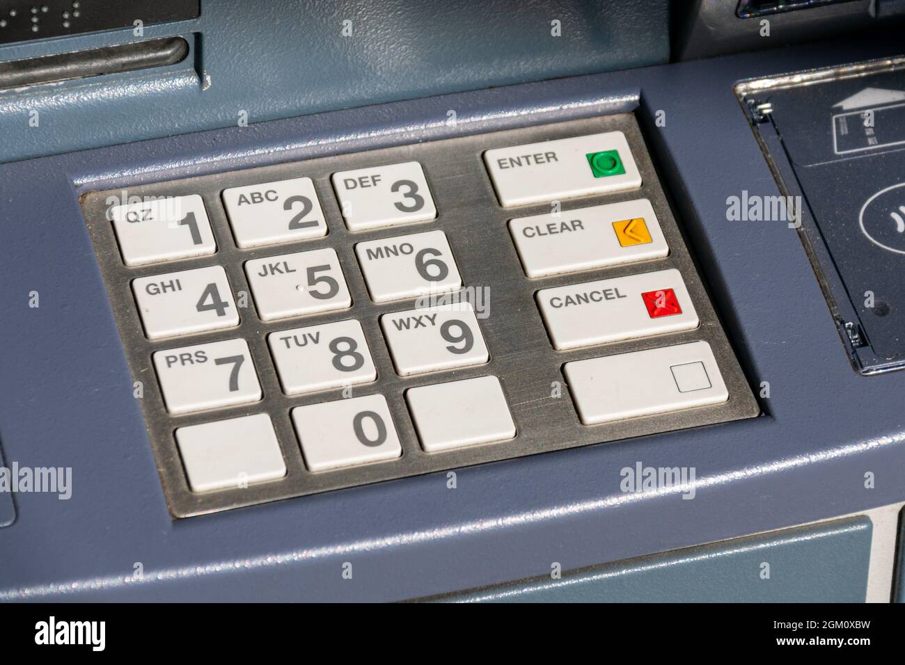 ATM keyboard with plastic buttons for pin code entry with numbers and  letters. Side view. Close up Stock Photo - Alamy