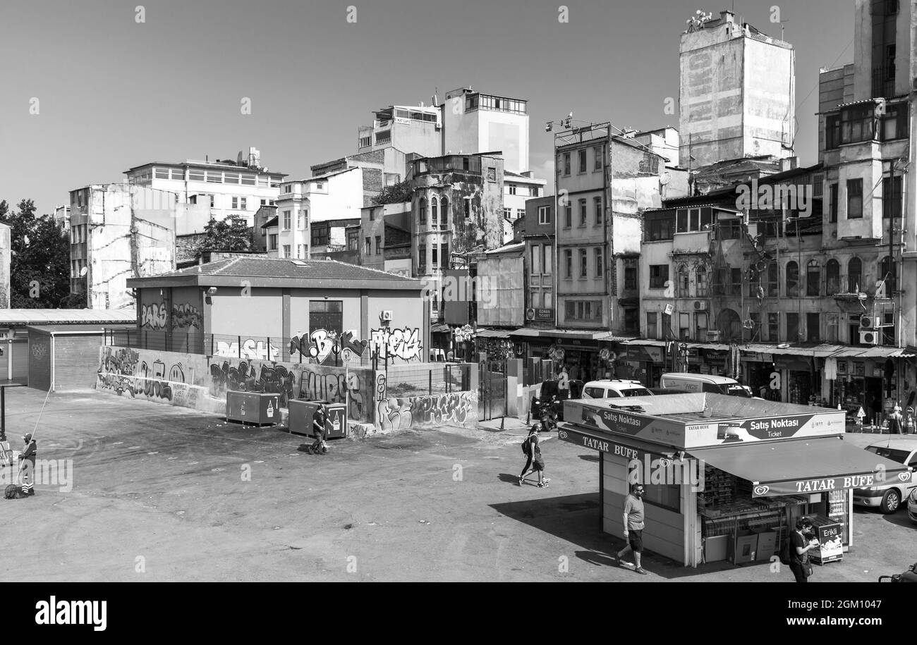 Istanbul, Turkey - July 1, 2016: Karakoy street view with walking people, commercial quarter in the Beyoglu district of Istanbul, black and white phot Stock Photo