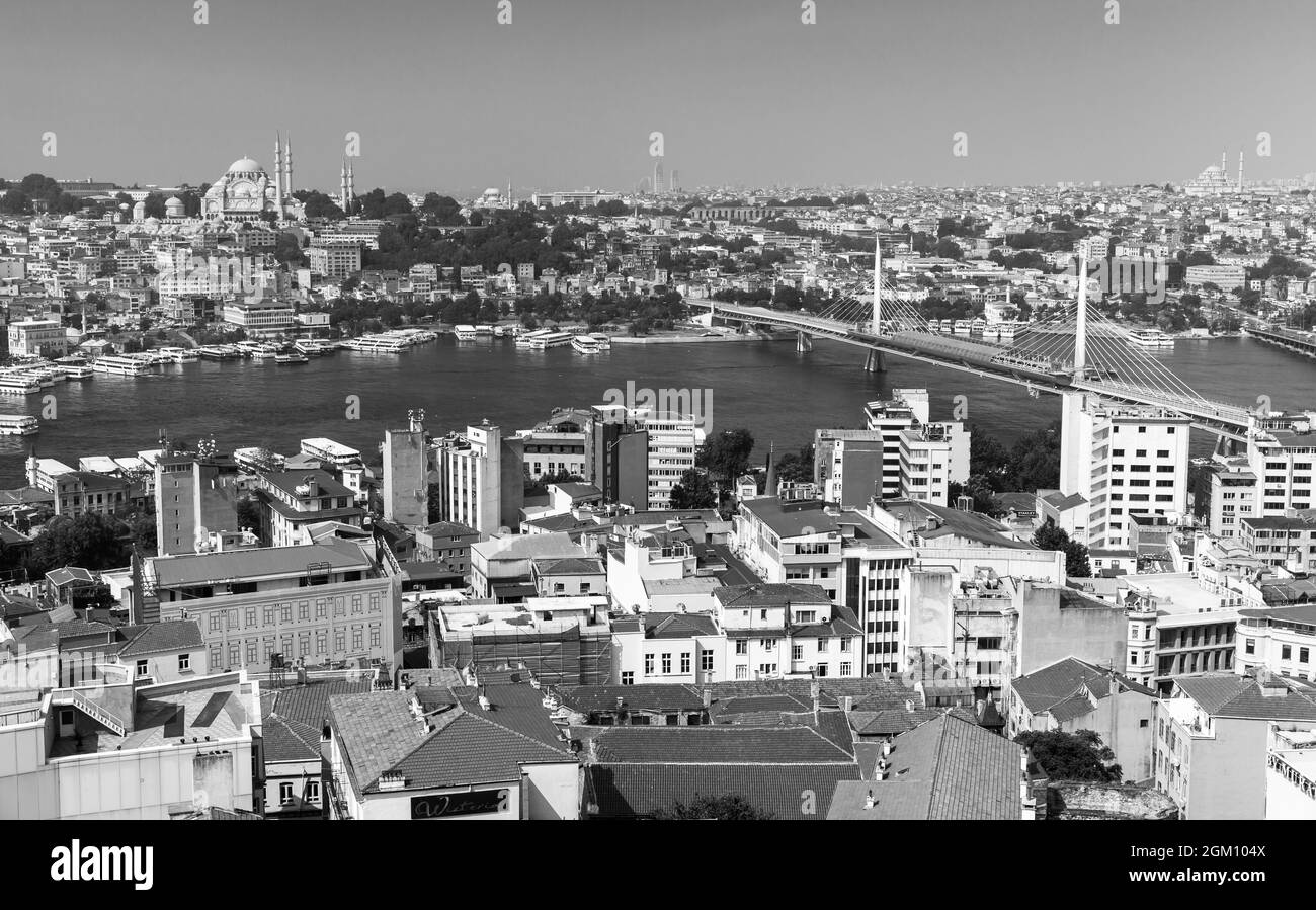 Istanbul, Turkey - July 1, 2016: Aerial Istanbul view with Golden Horn Metro Bridge, black and white photo Stock Photo