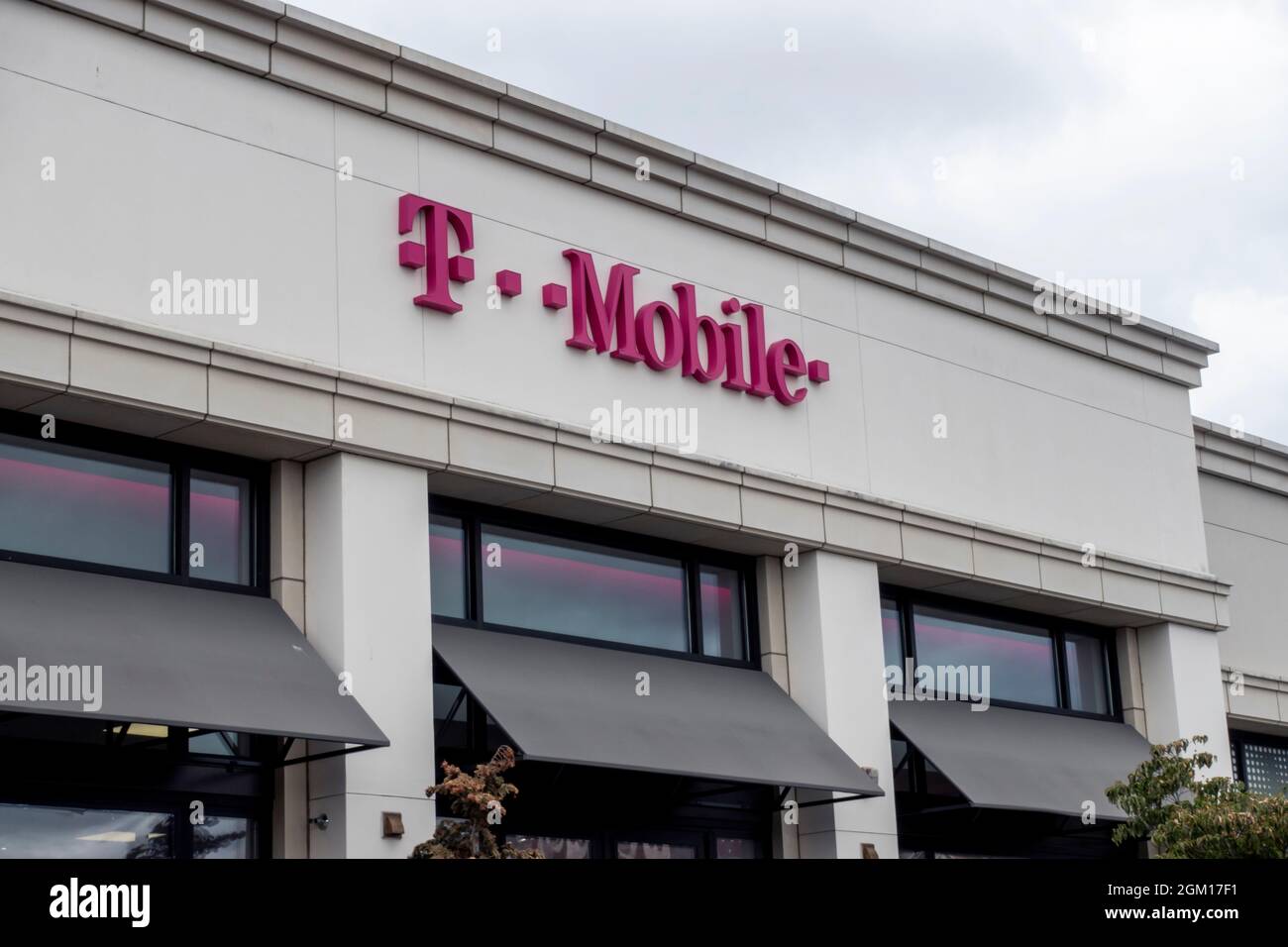 Kirkland, WA USA - circa July 2021: Low angle view of a T Mobile cell phone store in Totem Lake. Stock Photo