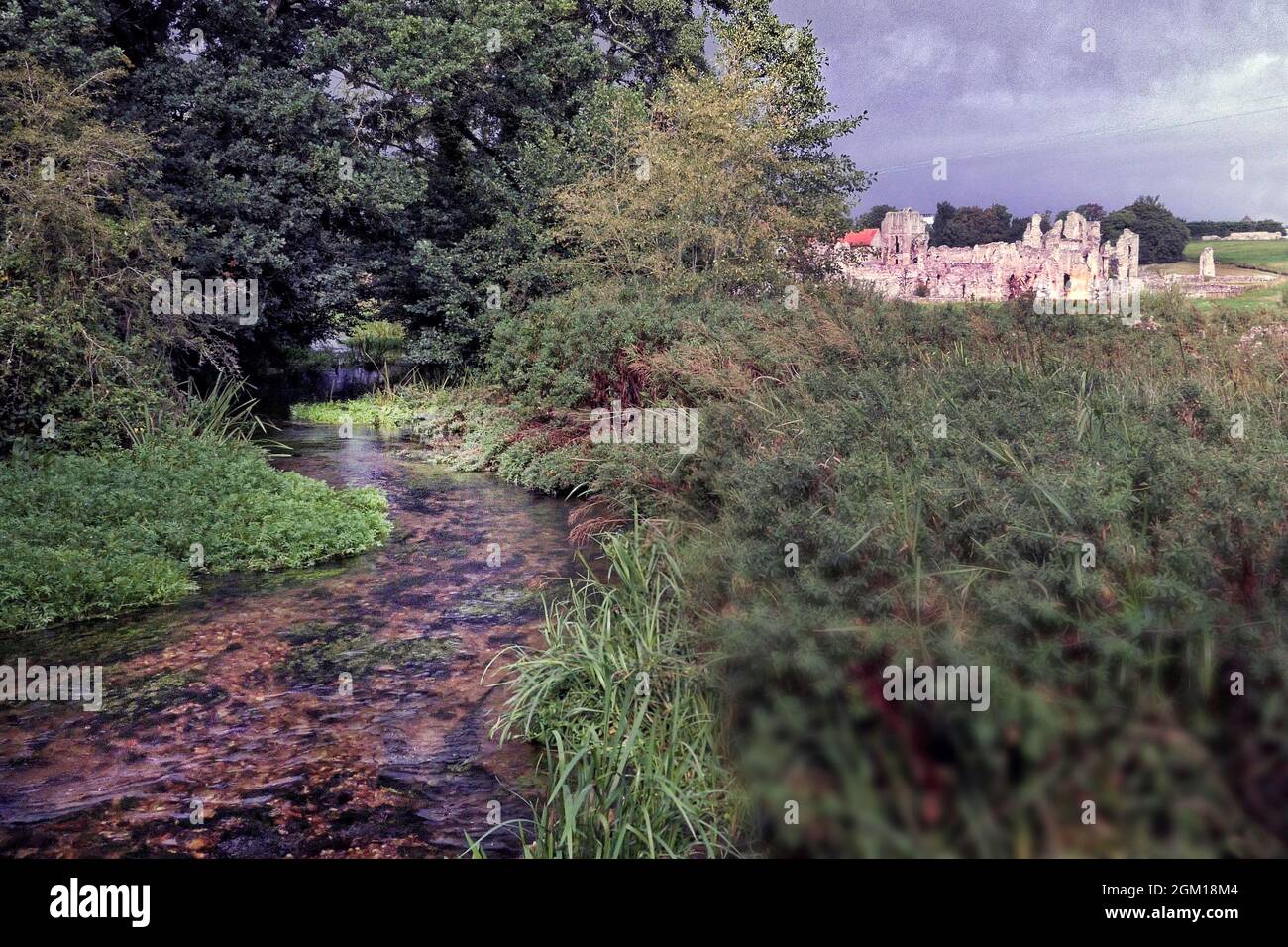 Castle Acre Priory on the River Nar Norfolk UK Stock Photo