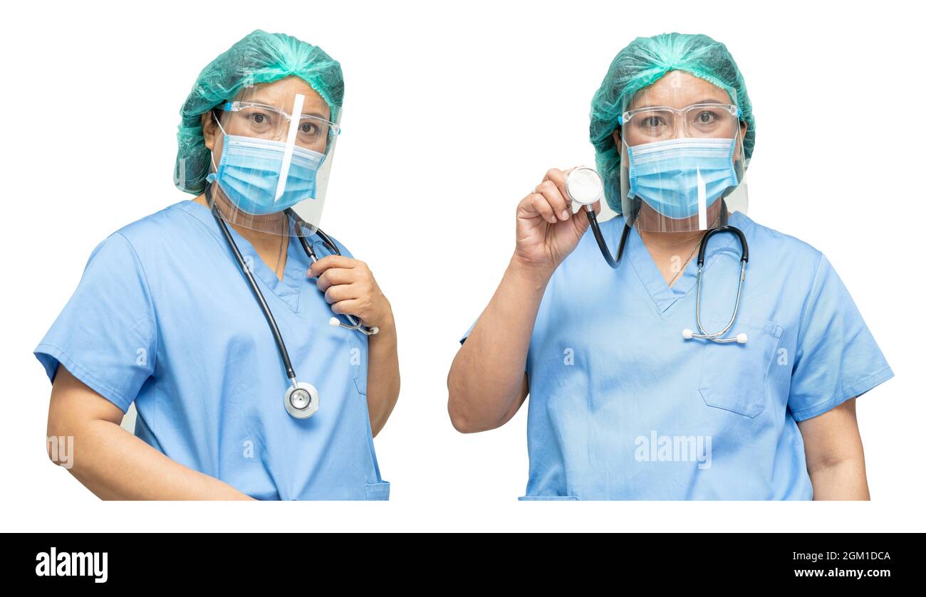 Asian doctor wearing face shield and PPE suit new normal to check patient protect safety infection Covid-19 Coronavirus outbreak at quarantine nursing Stock Photo