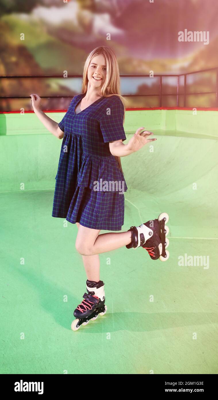 Charming teenage girl at roller skating rink Stock Photo Alamy