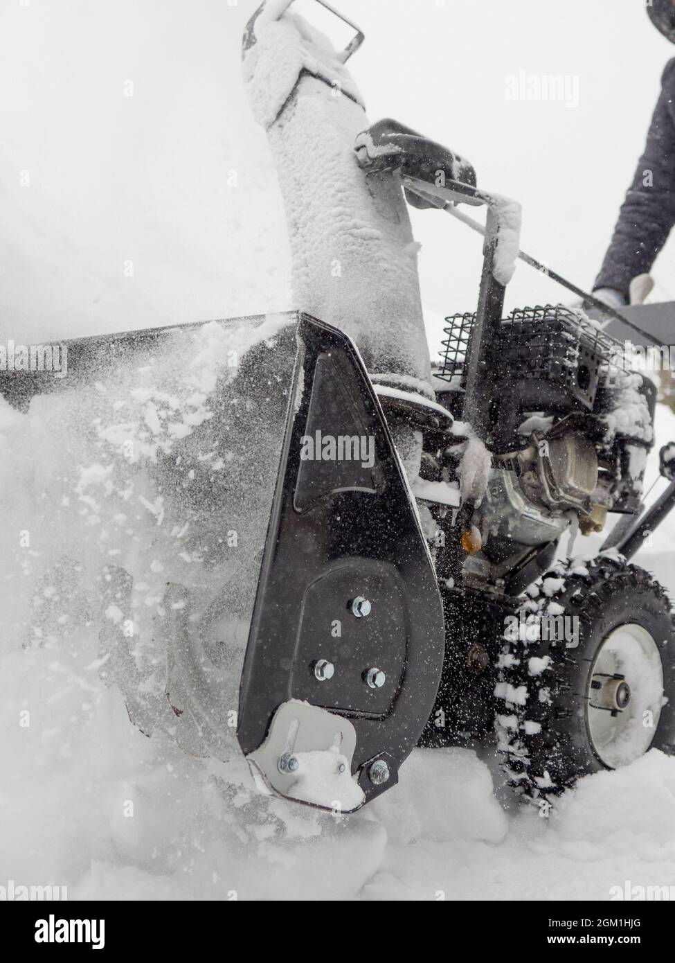 Clearing snow with a snowblower after a heavy snowfall Stock Photo Alamy