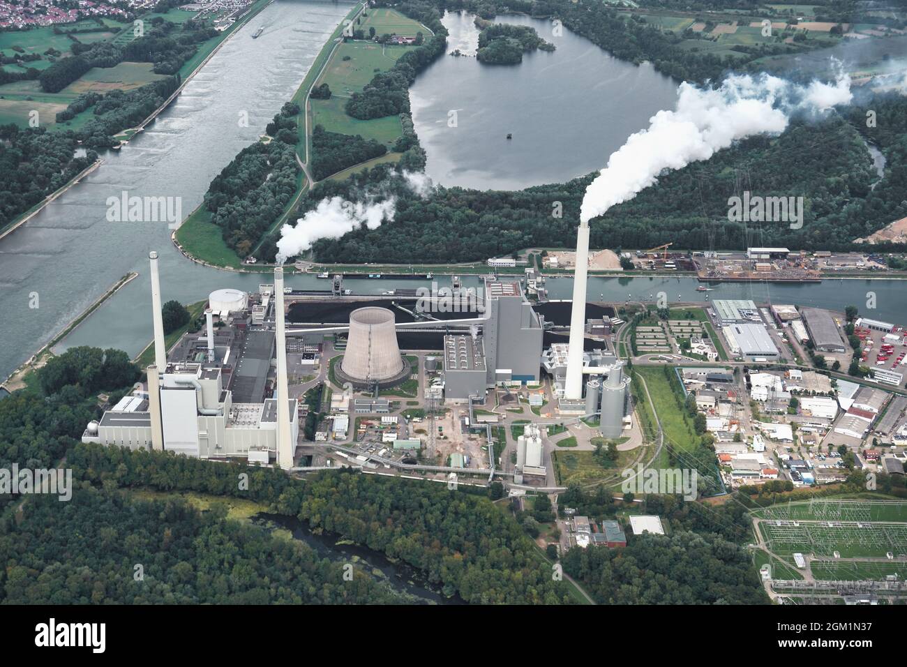 Aerial view of steam and coal power plant in Karlsruhe, rhine harbor. Thermal power station operated by EnBW energy company, Germany. Stock Photo