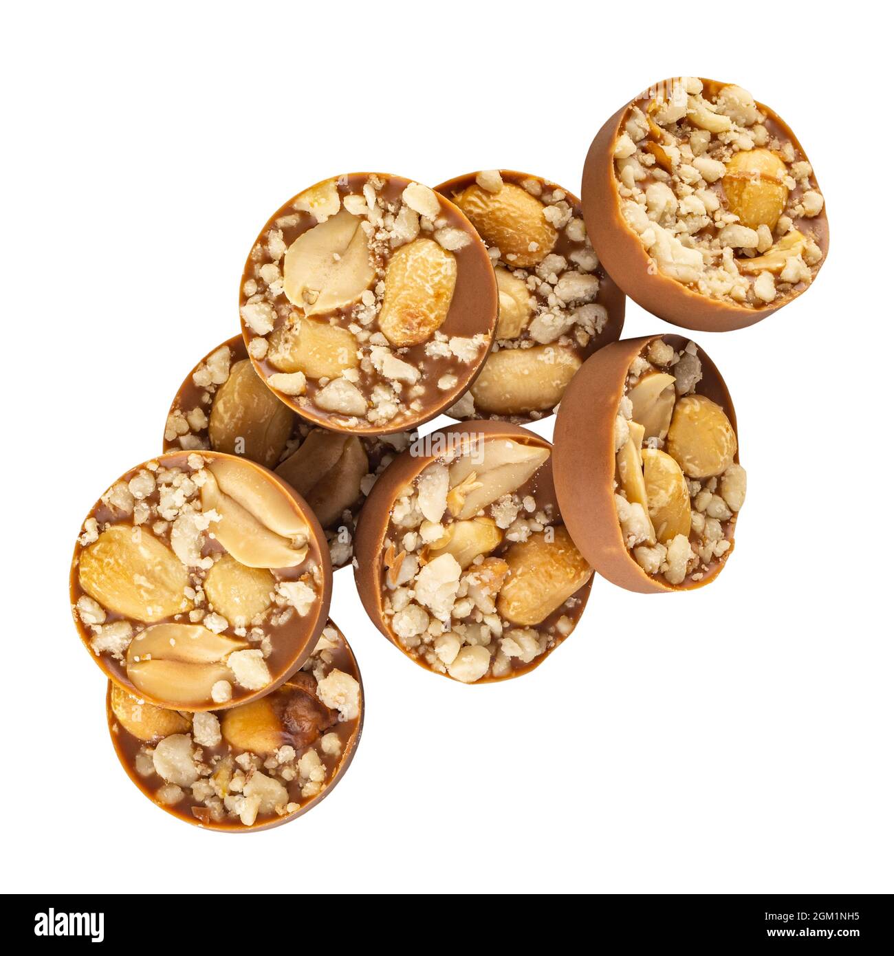 Milk chocolate praline with hazelnut crumb topping on white background Stock Photo