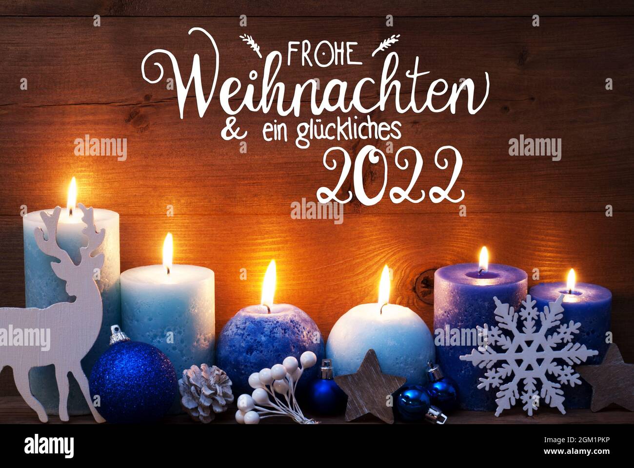 Christmas Concert Dec 4 2022 German Calligraphy Frohe Weihnachten Und Ein Glueckliches 2022 Mean Merry  Christmas And Happy 2022. Turquoise Romantic Candle Light With Christmas Dec  Stock Photo - Alamy
