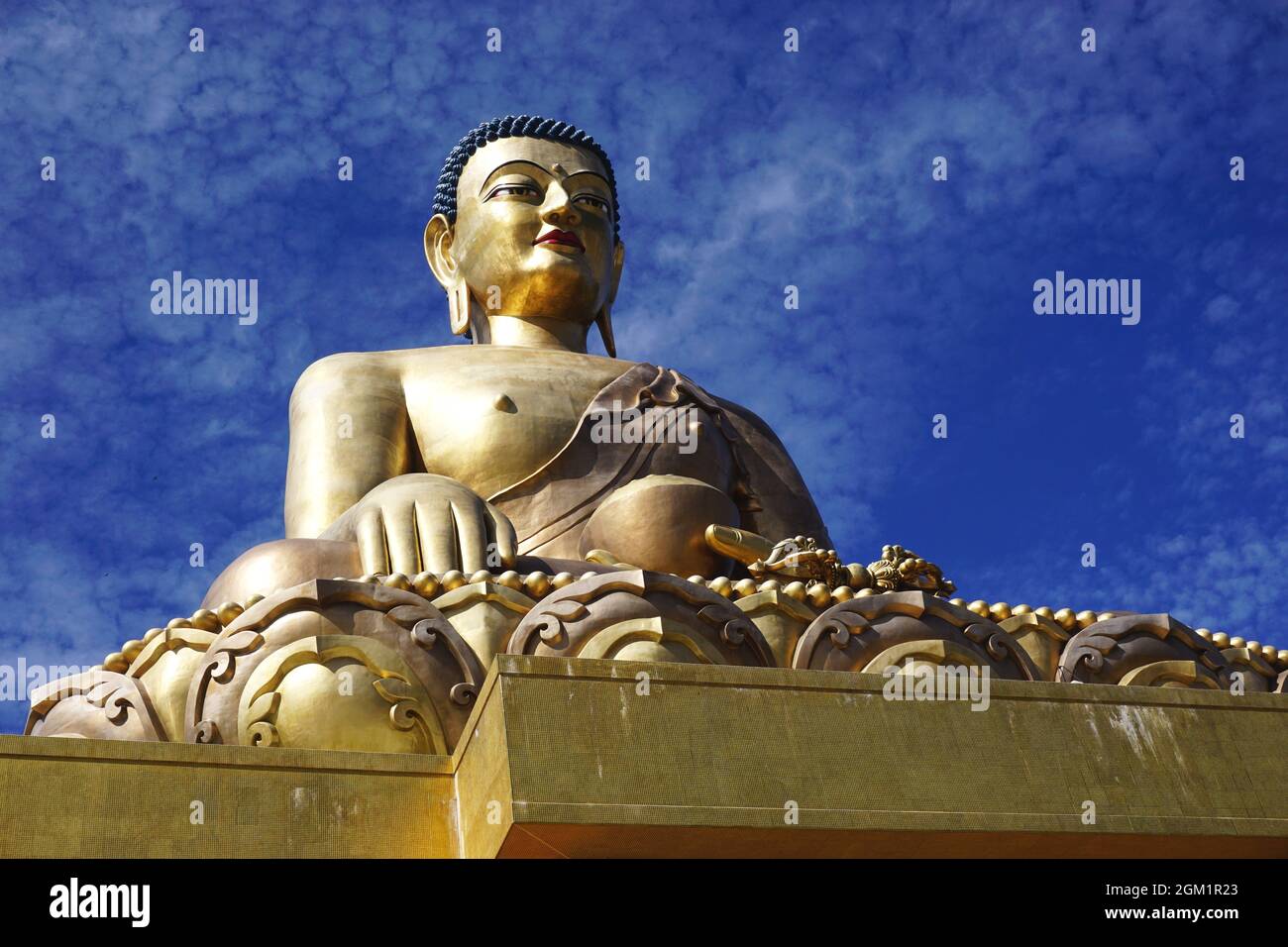 The 51.5-meter-tall Buddha Dordenma statue, sits on a mountain in the Kuensel Phodrang nature park overlooking the entrance to Thimphu Valley, Bhutan. Stock Photo
