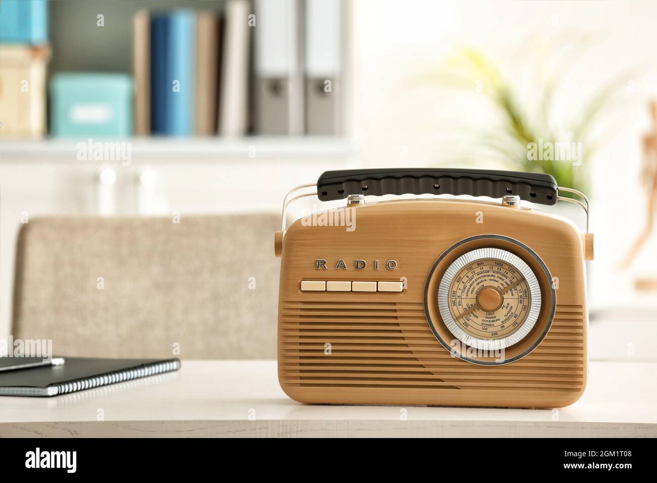 Stylish radio receiver on office table Stock Photo - Alamy