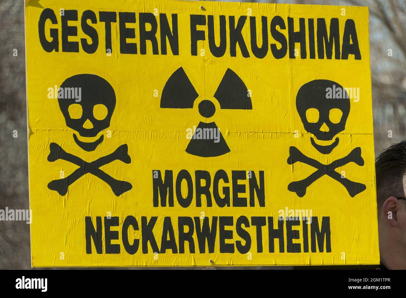 STUTTGART, GERMANY - Mar 12, 2011: Demonstration gegen Kernenergie direkt nach der Reaktorkatastrophe in Fukushima. Parolen: 'Atomkraft nein Danke', ' Stock Photo