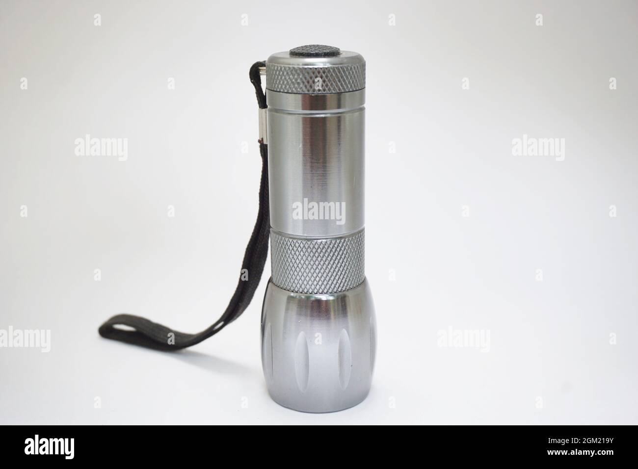 Isolated flashlight on white background Stock Photo - Alamy