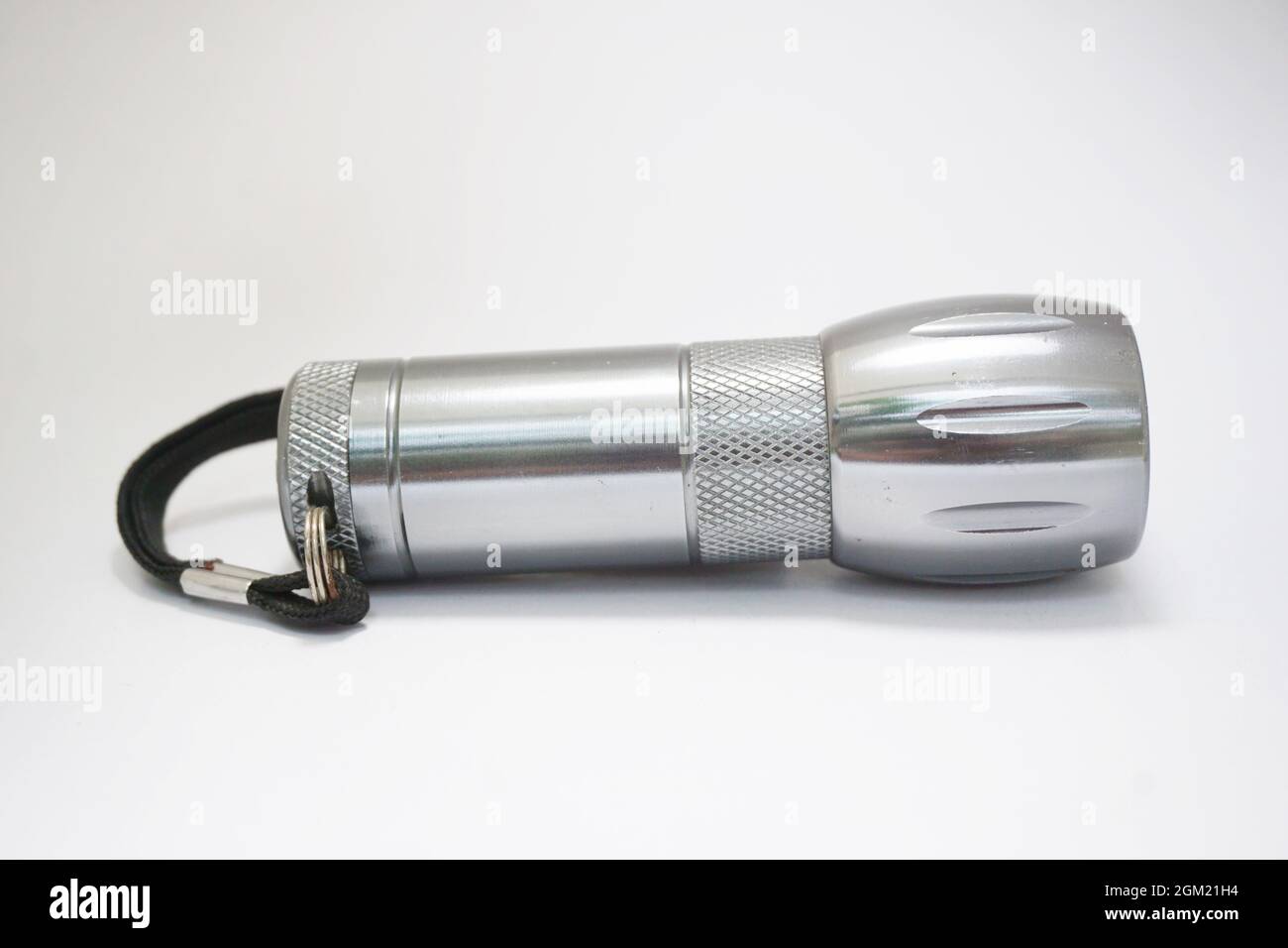 Isolated flashlight on white background Stock Photo - Alamy