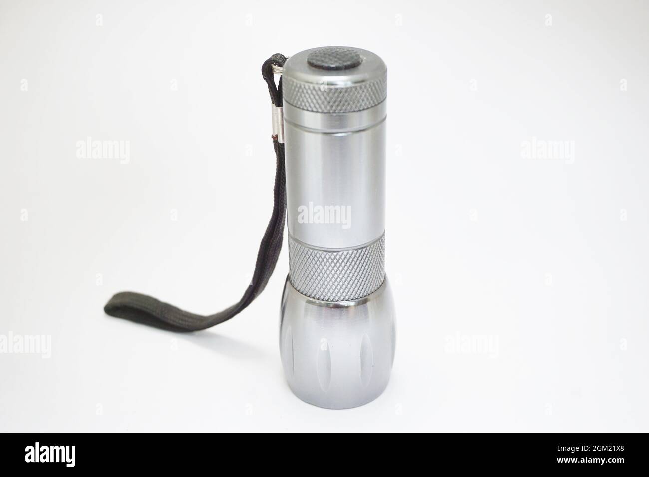 Isolated flashlight on white background Stock Photo - Alamy