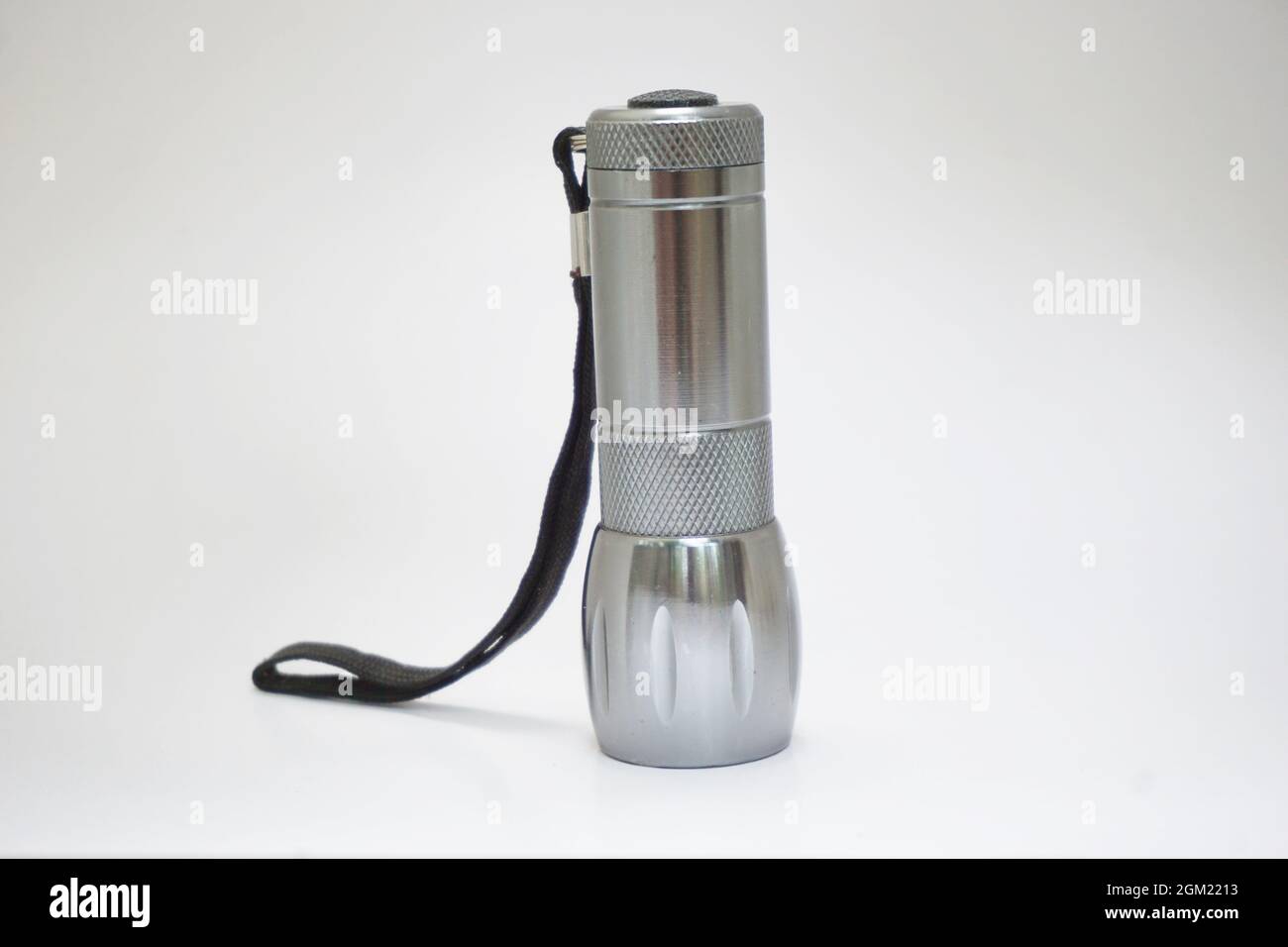 Isolated flashlight on white background Stock Photo - Alamy