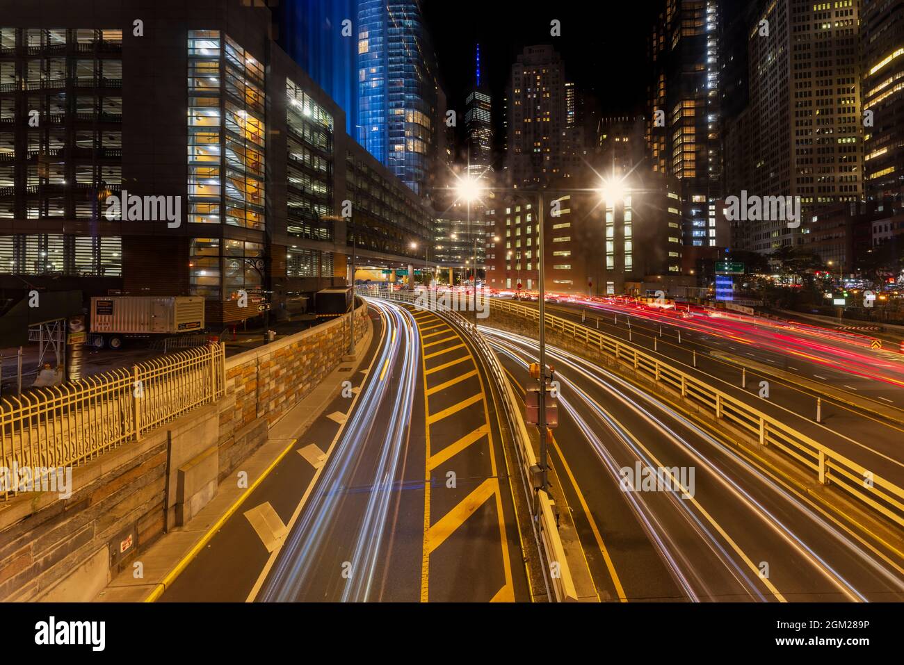 Helix To Battery Tunnel NYC - View to vehicular traffic at the entrance of the Hugh L. Carey Tunnel.  The Brooklyn–Battery Tunnel is a toll tunnel in Stock Photo