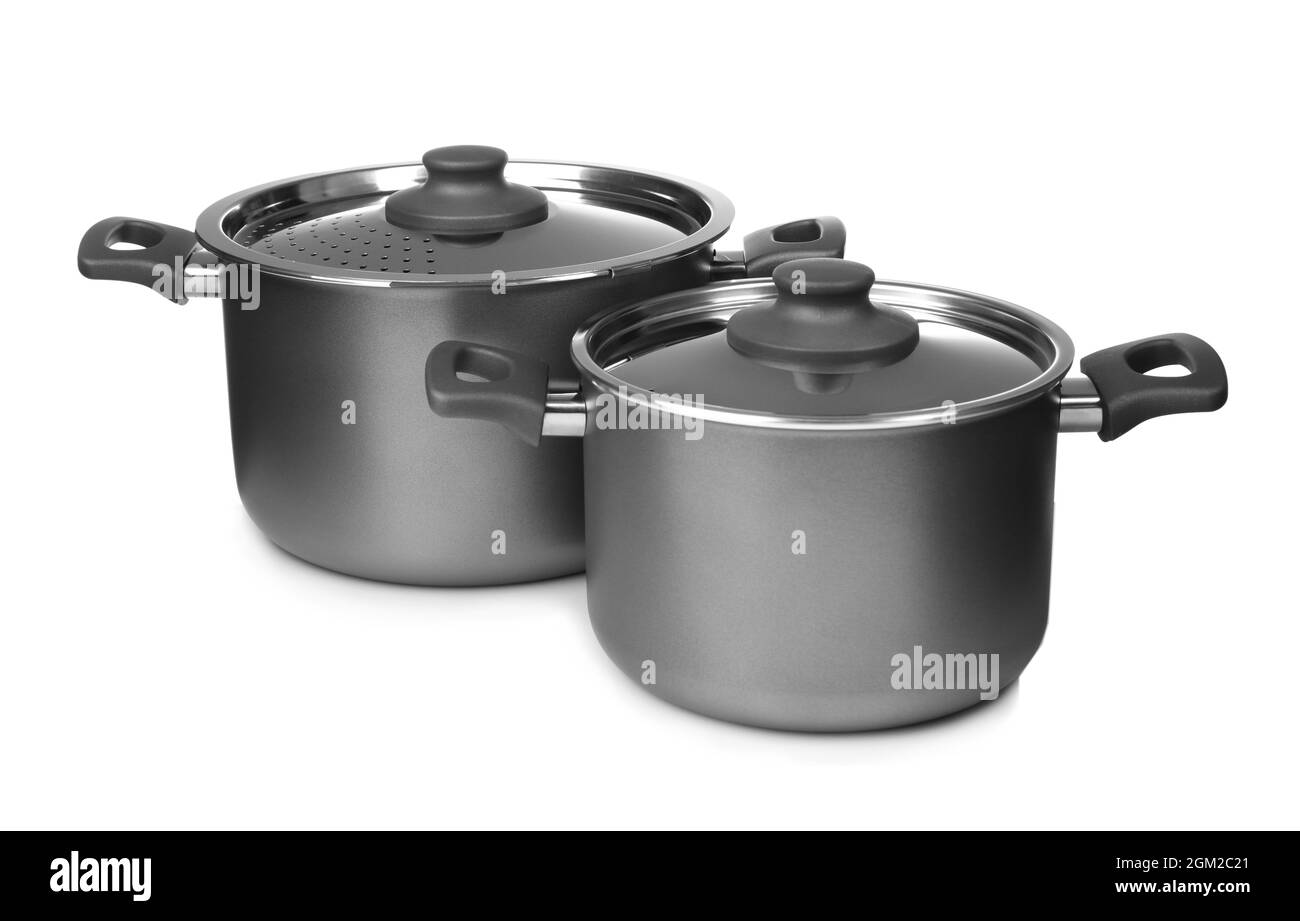 Saucepans on white background Stock Photo Alamy