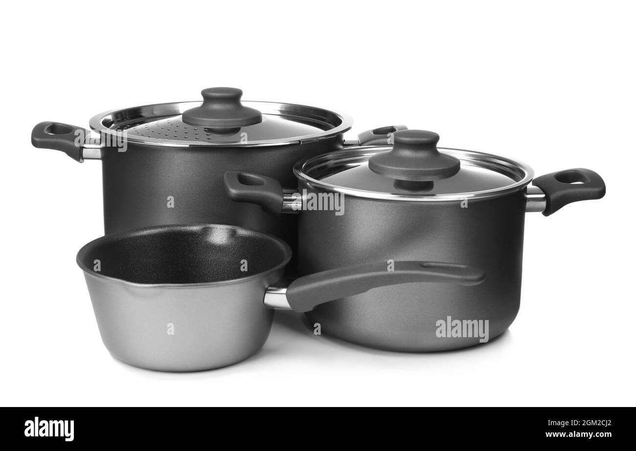 Saucepans on white background Stock Photo Alamy