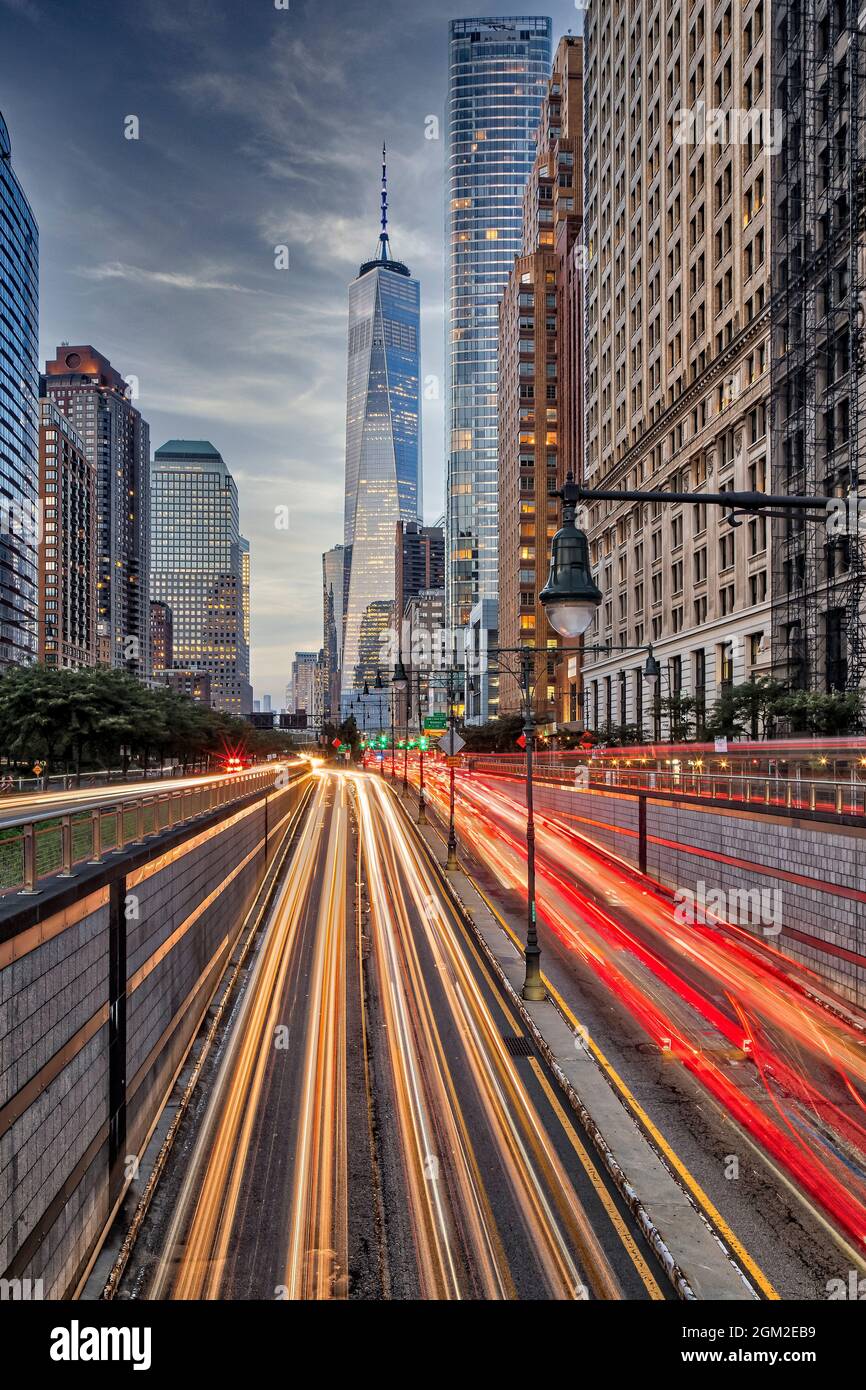NYC  World Trade Center Rush - View to traffic leading to and from One World Trade Center, commonly known as the Freedom Tower and to the Battery Park Stock Photo