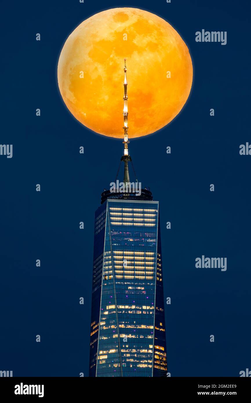 World Trade Center Super Moon - Close view to the upper portion of the World Trade Center coined the Freedom Tower in NYC with the 'Worm or Lent Super Stock Photo