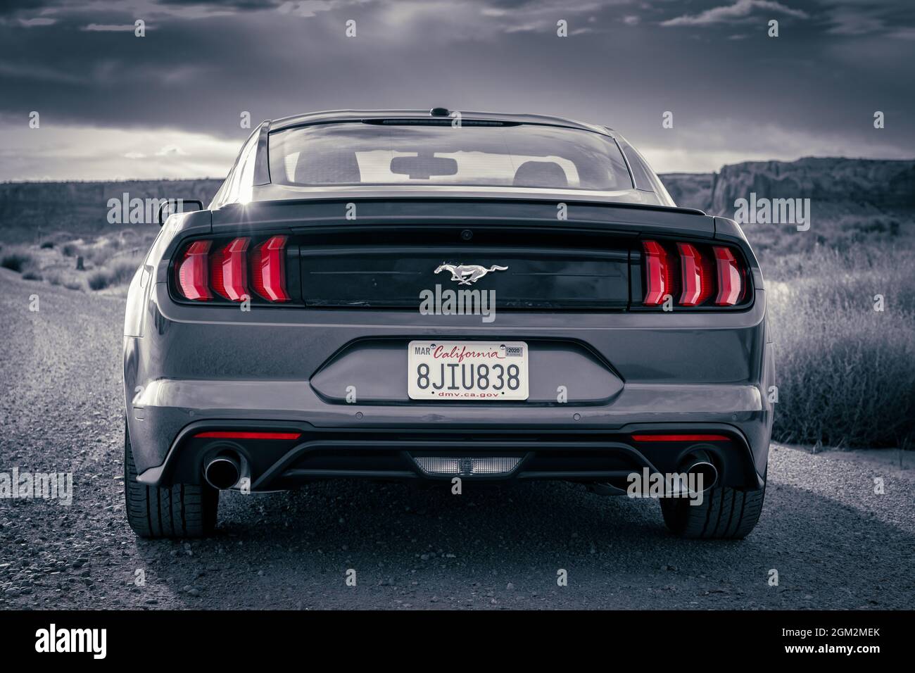 Ford Mustang American muscle car stylized in black and white with red accent tail light Stock Photo