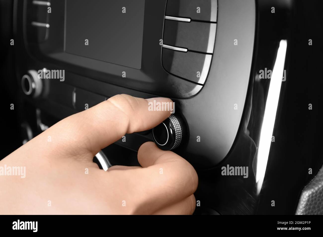 Man tuning radio in car Stock Photo Alamy