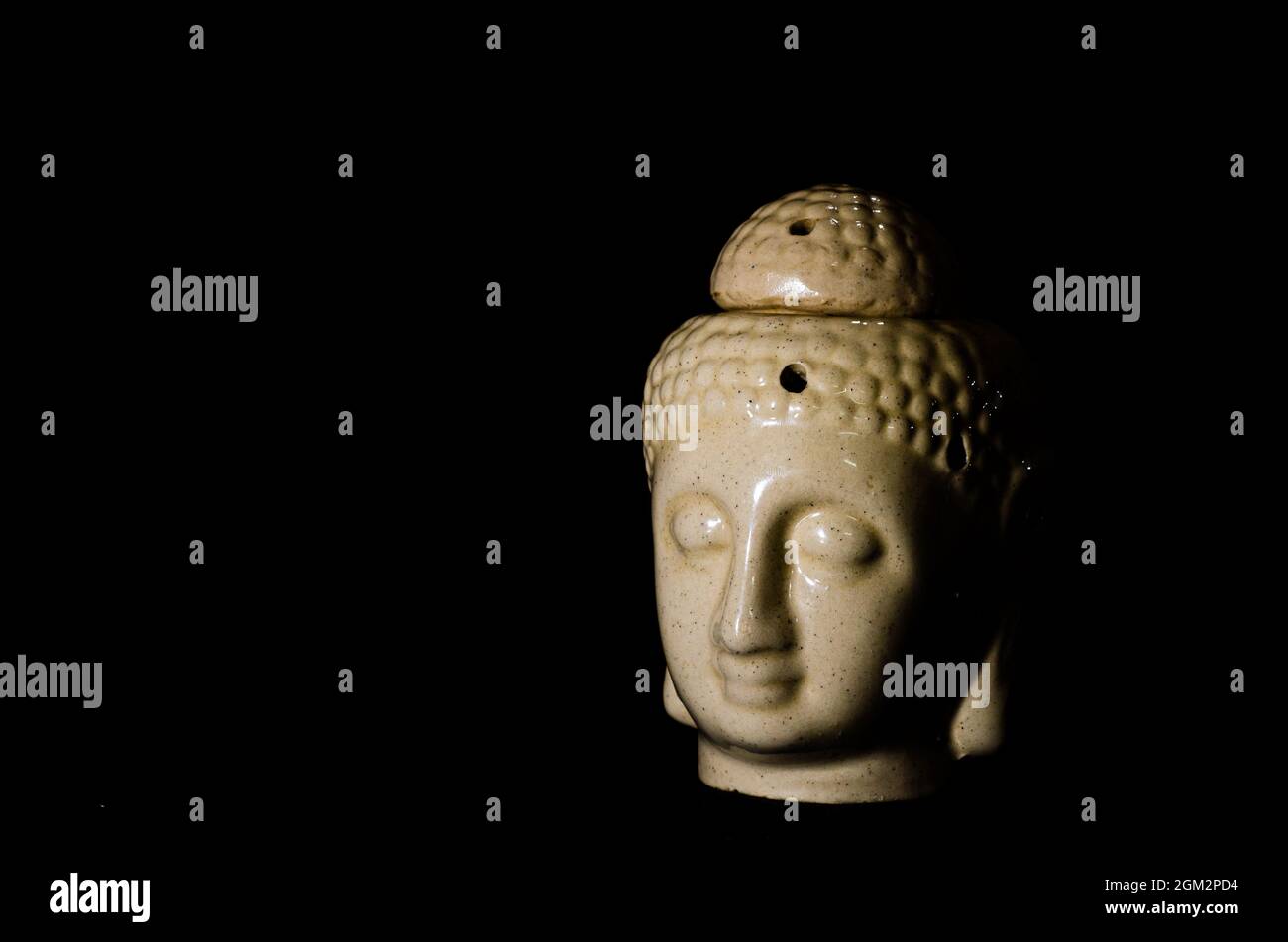 Peaceful Buddha lamp and diffuser for home Stock Photo