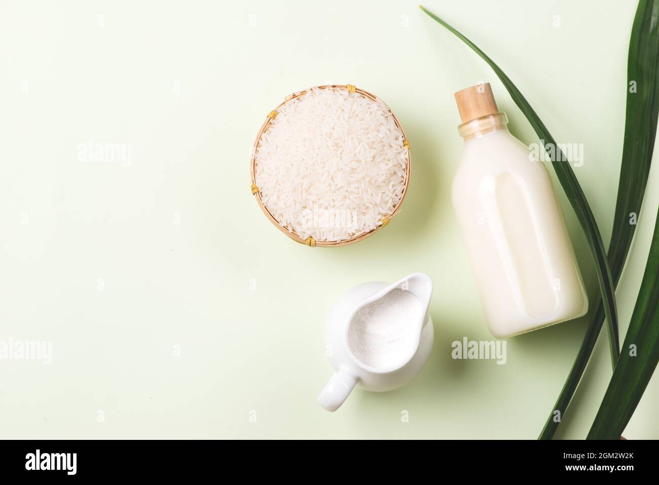 The water that clean out rice like milk in the glass bottle and Some ...