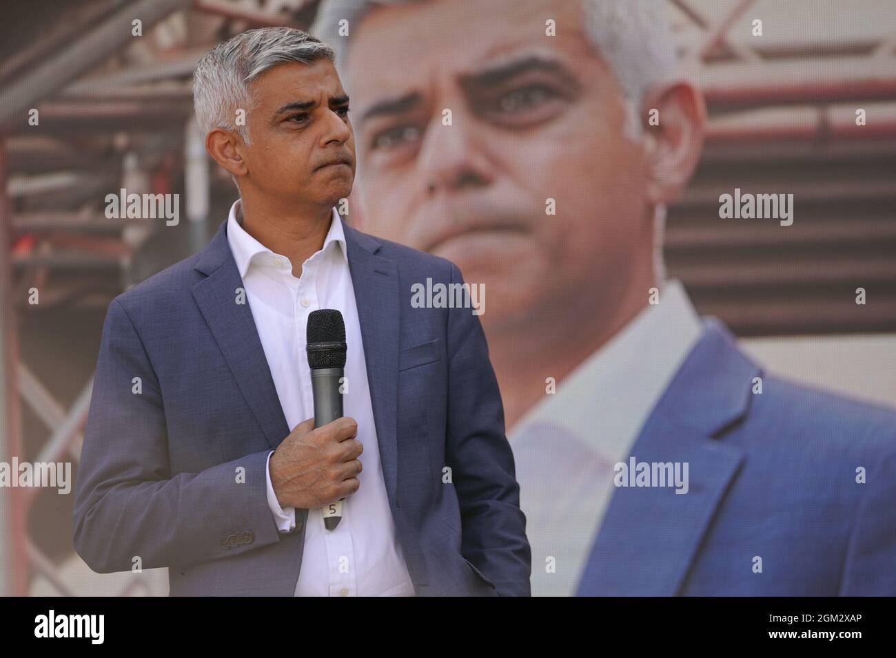 Mayor of London Sadiq Khan speaks to protesters from Leaseholders Together gather at rally in Parliament Square, Westminster, central London, who are demanding help from the government over repair bills for their properties which are encased in potentially lethal cladding. Picture date: Thursday September 16, 2021. Stock Photo