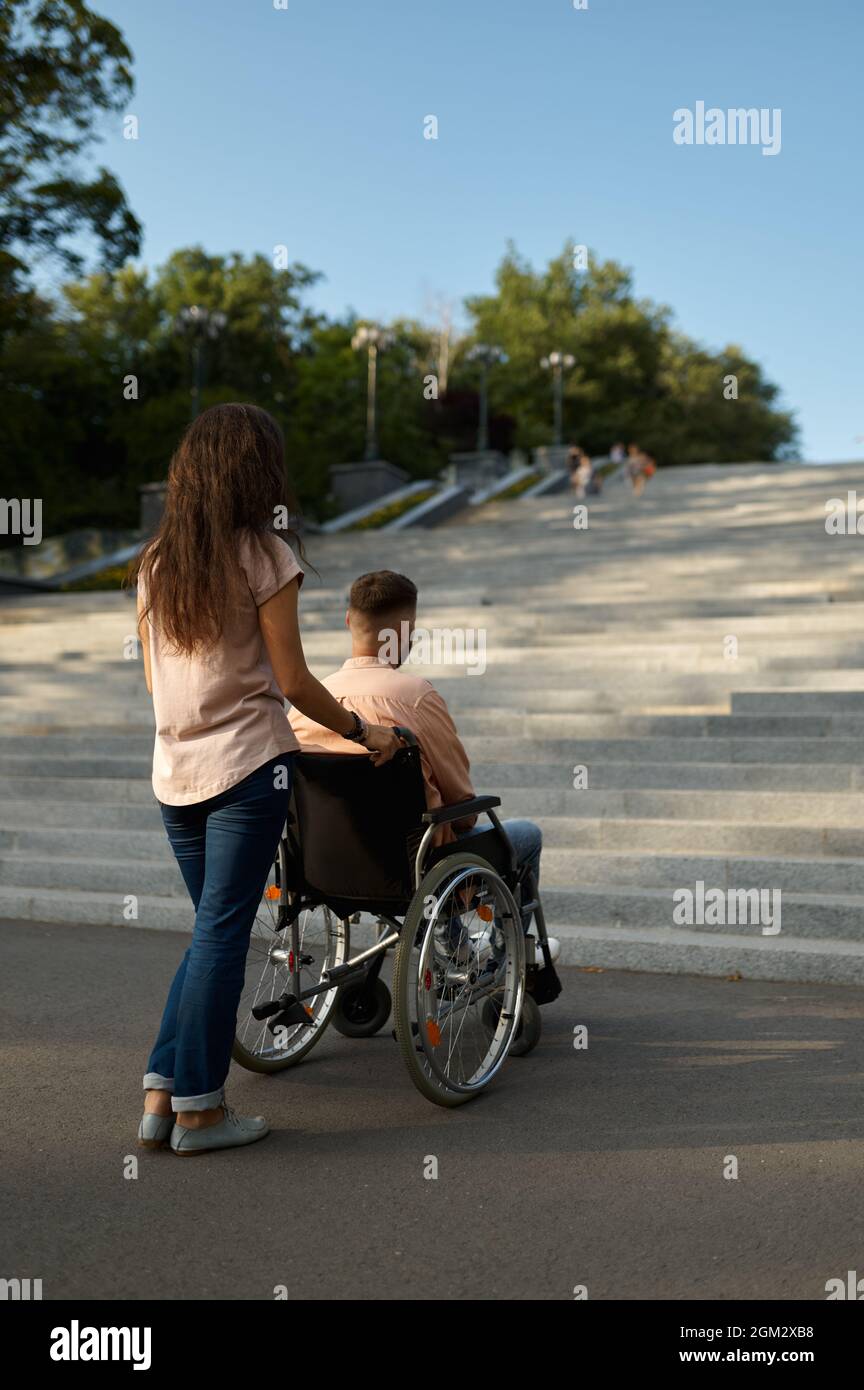 Woman wheelchair stairs hi-res stock photography and images - Alamy