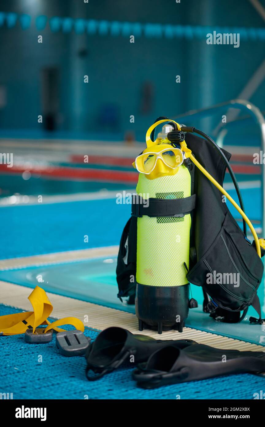 An oxygen tank at poolside, diving equipment Stock Photo Alamy