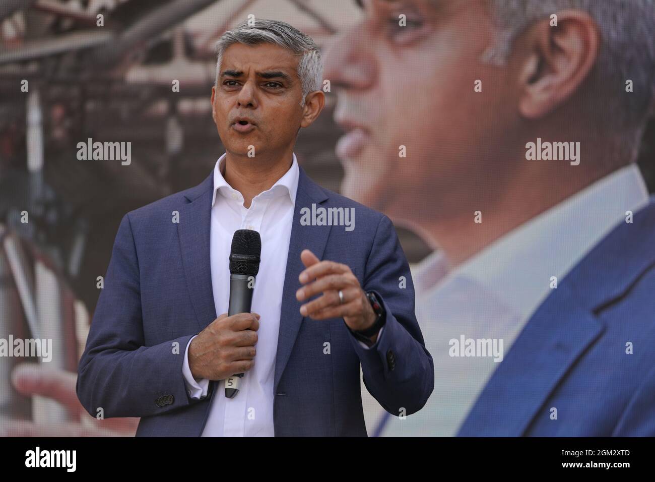 Mayor of London Sadiq Khan speaks to protesters from Leaseholders Together gather at rally in Parliament Square, Westminster, central London, who are demanding help from the government over repair bills for their properties which are encased in potentially lethal cladding. Picture date: Thursday September 16, 2021. Stock Photo