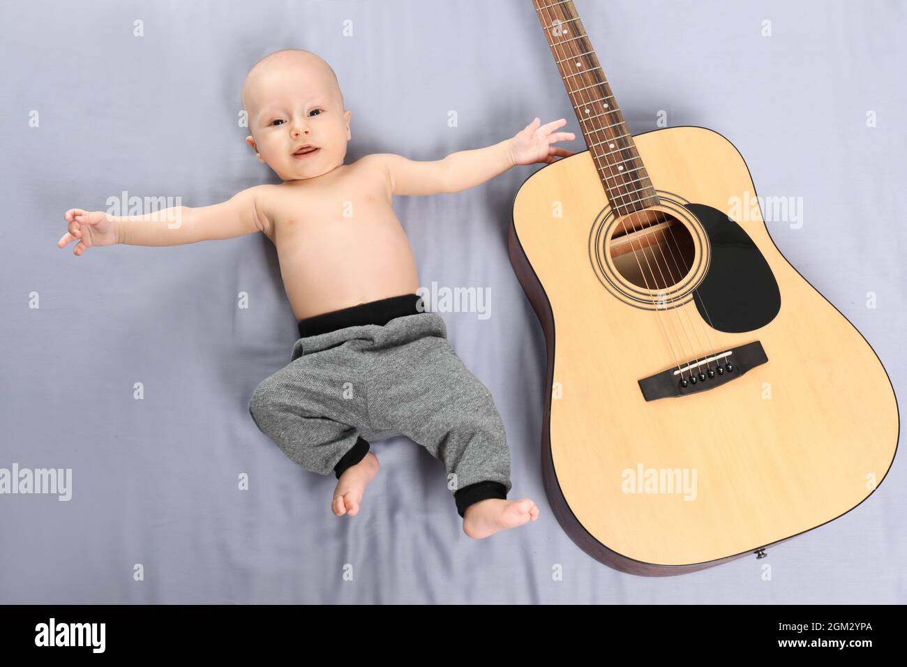 Baby With Guitar High Resolution Stock Photography And Images Alamy
