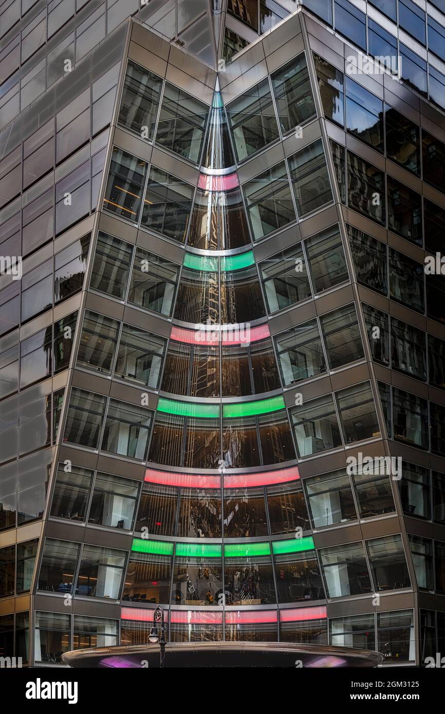 NYC Christmas Architecture -  A look at the modern architecture of one of New York City's skyscraper. The facade of the skyscraper is decorated with r Stock Photo