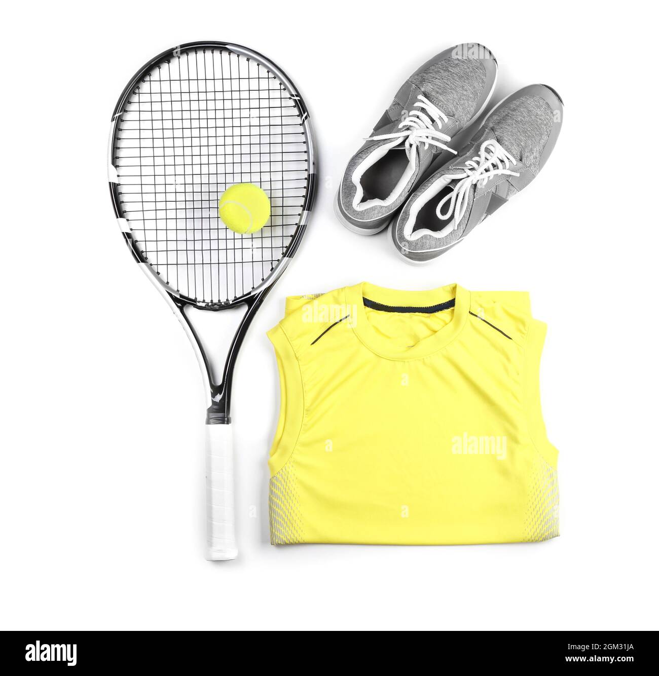 Tennis racket, ball, clothes and shoes on white background Stock Photo