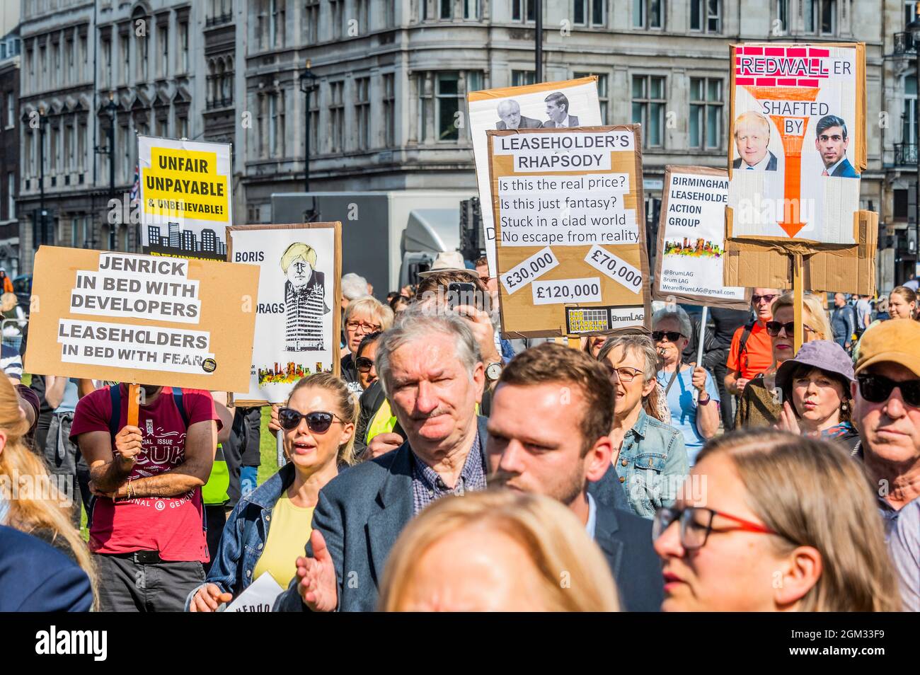 London, UK. 16th Sep, 2021. A cladding protest in Parliament Square highlights how many people have been caught in properties that are now worthless or ones which they cannot afford to repair as a result of the cladding repair crisis which followed the Grenfell Tower disaster. The protest was attended by leaseholders and MP's. Credit: Guy Bell/Alamy Live News Stock Photo