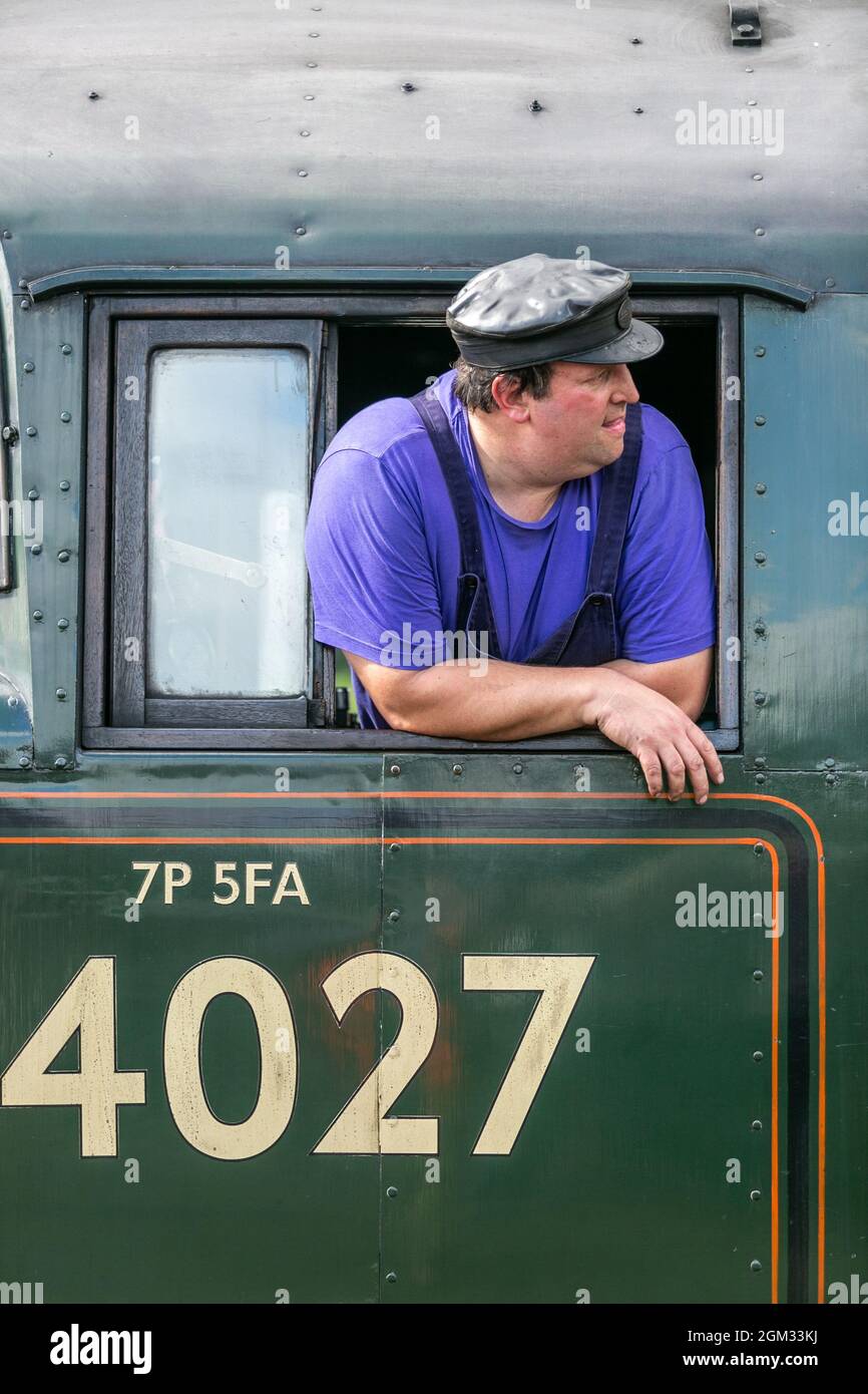 Kidderminster, Worcs, UK. 16th September, 2021. A steam train driver awaits the signal to proceed at the Severn Valley Railway station, Kidderminster, on the opening day of the Severn Valley Railway's Autumn Steam Gala, Kidderminster, Worcestershire. The gala lasts until Sunday 19th September and features guest locos. Peter Lopeman/Alamy Live News Stock Photo